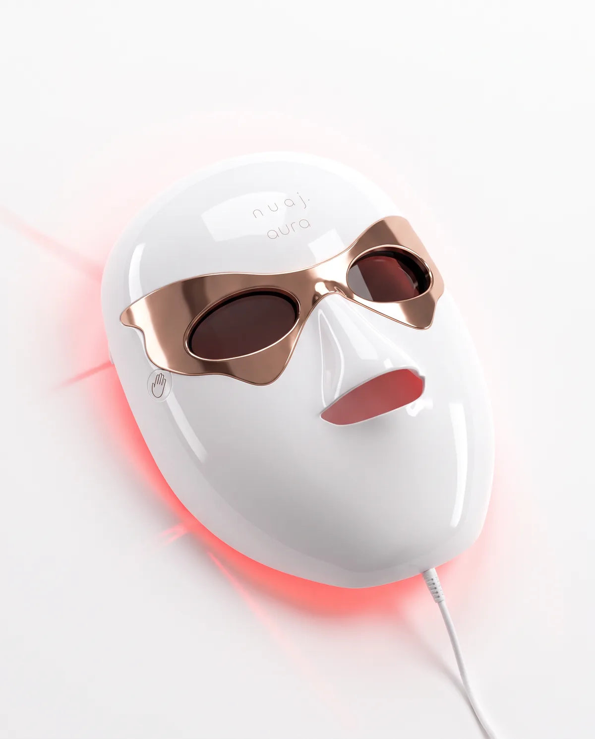 nuaj. aura LED face mask, rose-gold visor, red glow